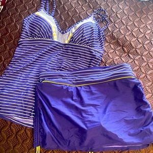 Athleta swimsuit and matching t-shirt cover up.